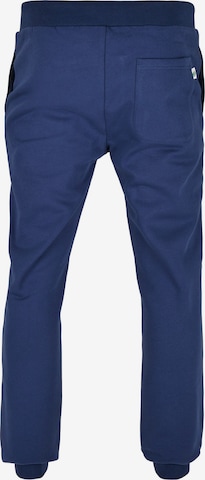 Urban Classics Tapered Housut 'Basic' värissä sininen