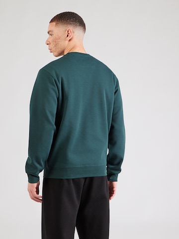 žalia GUESS Megztinis be užsegimo