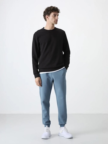 Regular Pantalon de sport Tommy Life en bleu