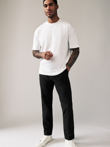 regular Pantaloni chino di Next in nero