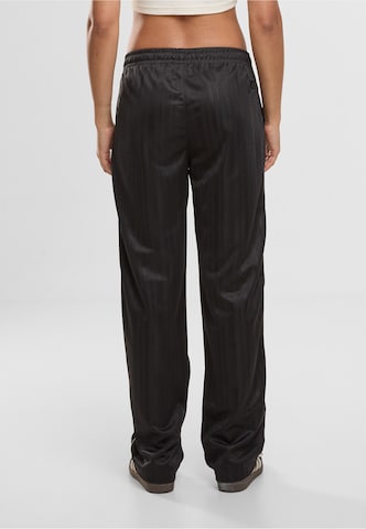 regular Pantaloni di Karl Kani in nero