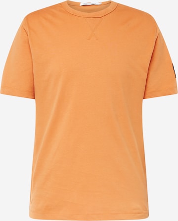 Calvin Klein Jeans - Camisa em laranja: frente