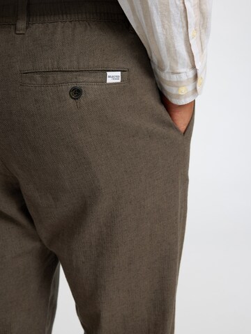 SELECTED HOMME Slim fit Chino trousers 'SLHBRODY' in Green