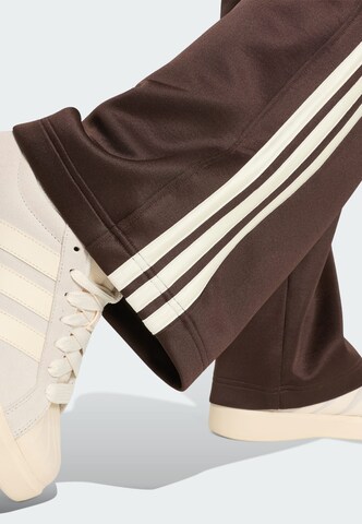 brūns ADIDAS SPORTSWEAR Vaļīgs piegriezums Sporta bikses 'Stadium'