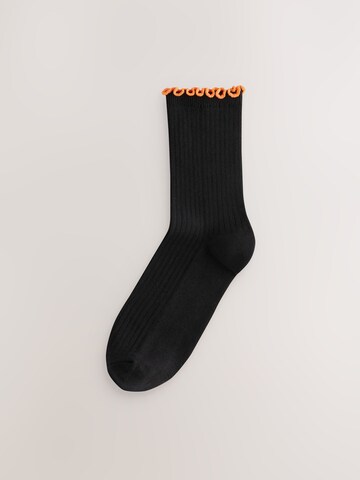 Next Sockor i svart