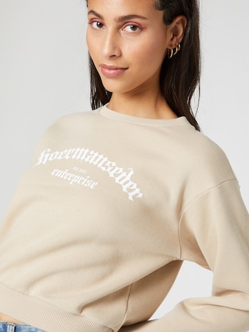 Hoermanseder x About You Sweatshirt 'Ela' in Beige