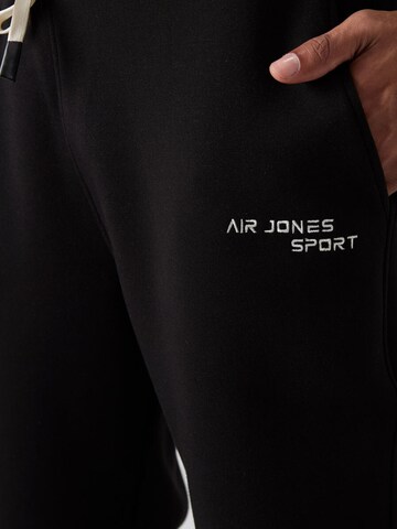 Tommy Life Trainingspak 'Aktive Sets' in Zwart
