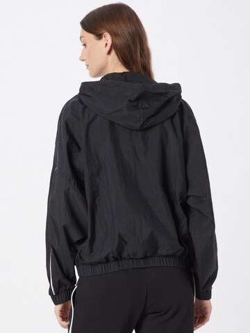 Reebok Sportjacke in Schwarz