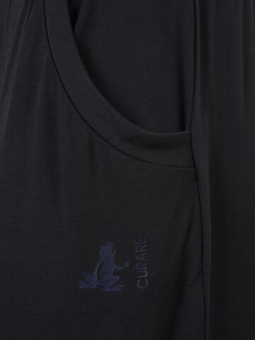 CURARE Yogawear Zwężany krój Spodnie sportowe w kolorze czarny