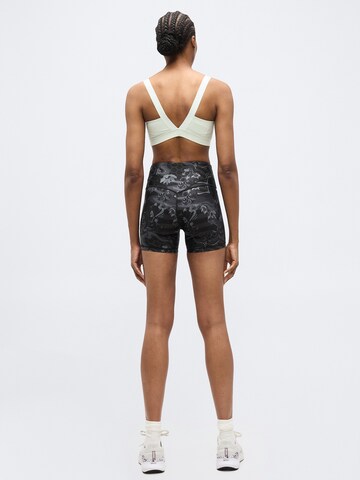 PUMA Skinny Urheiluhousut 'League' värissä musta