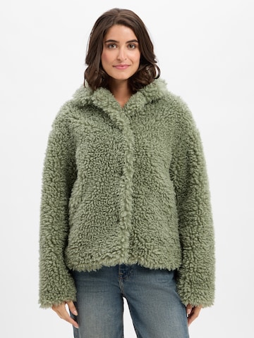Amber & June Between-Season Jacket in Green: front