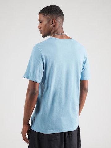 Nike Sportswear T-shirt 'CLUB' i blå