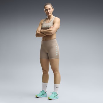 Skinny Pantalon de sport 'Puma x Hyrox Essentials' PUMA en beige