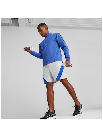 Vestes d’entraînement PUMA en bleu : devant