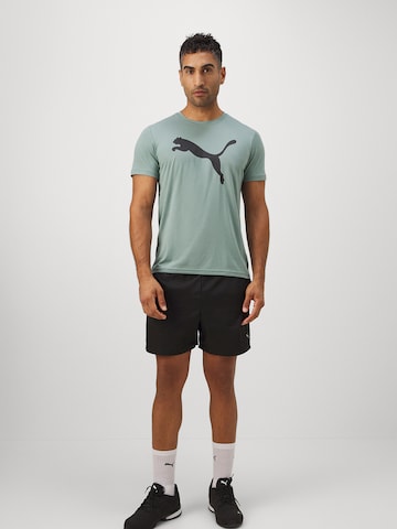 PUMA Koszulka funkcyjna 'Tad Essentials' w kolorze zielony