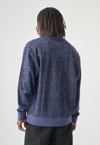 Cleptomanicx Sweater in Blue