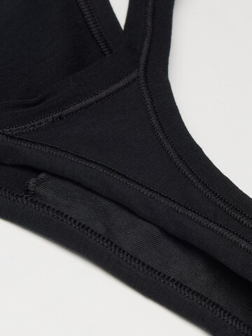 INTIMISSIMI String in Schwarz