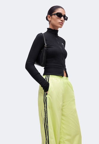 ADIDAS ORIGINALS Široke hlačnice Hlače 'Teamgeist' | rumena barva