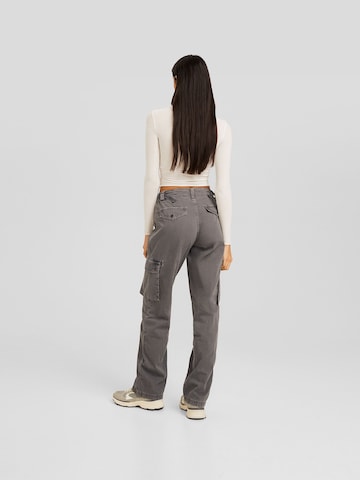 Bershka Loose fit Cargo trousers in Grey