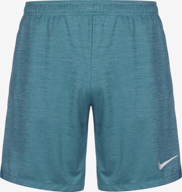 Regular Pantalon de sport NIKE en bleu : devant