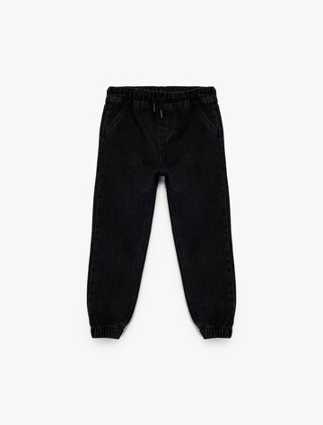 Koton Tapered Jeans in Black: front