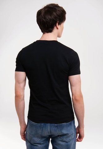 LOGOSHIRT T-Shirt 'Looney Tunes - Coyote Mond' in Schwarz