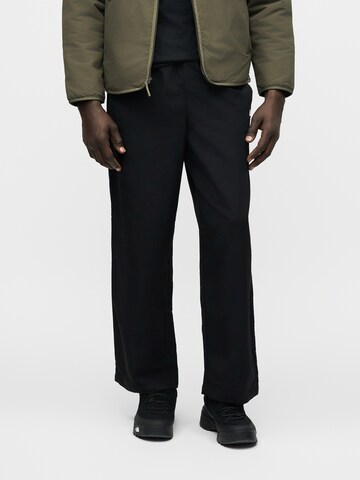 THE NORTH FACE Lużny krój Spodnie w kolorze czarny: przód