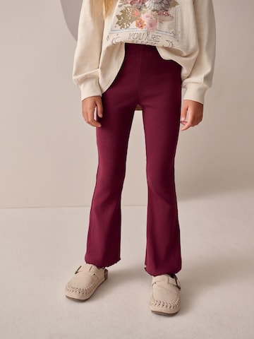 Next - Acampanado Leggings en rojo