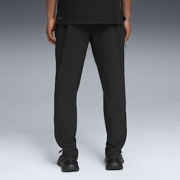 Effilé Pantalon de sport PUMA en noir