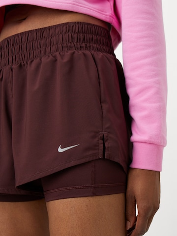 Regular Pantalon de sport 'ONE' NIKE en rouge