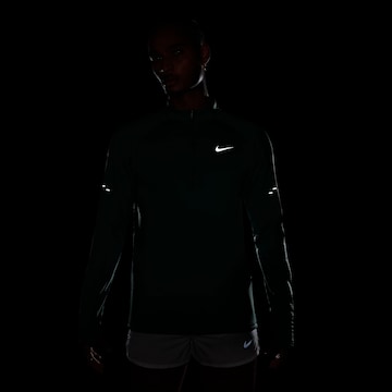 NIKE Performance Shirt 'WINTRZD STRIDE' in Blue
