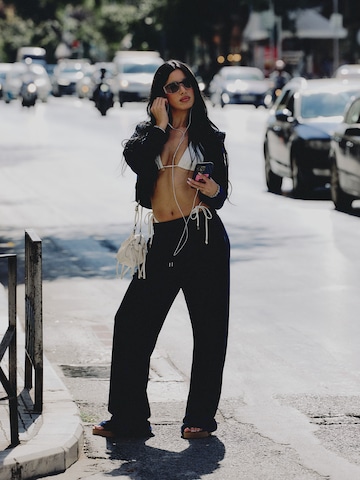 CHOLIDOU Flared Trousers in Blue