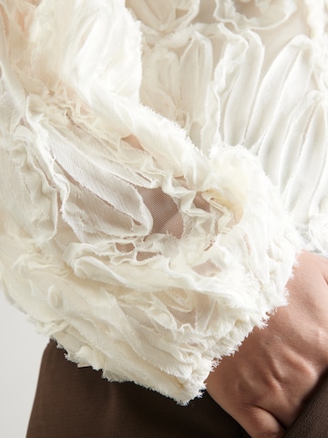 co'couture - Blusa en blanco