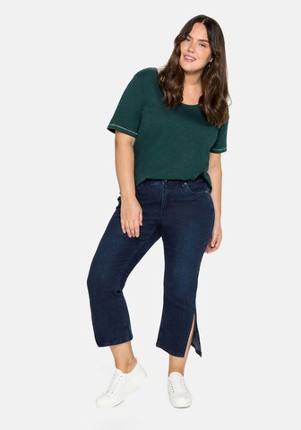 SHEEGO Flared Jeans in Blau