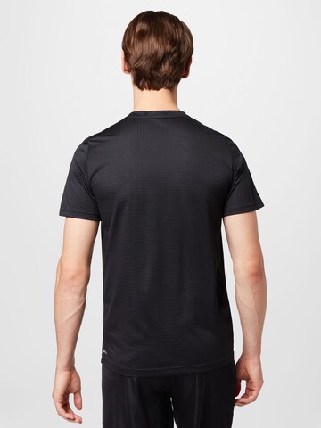 PUMA Funktionsshirt 'Fav Blaster' in Schwarz