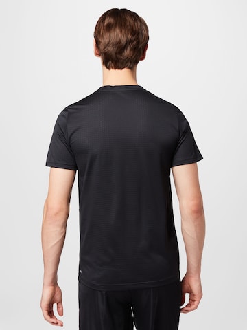PUMA قميص عملي 'Fav Blaster' بلون أسود