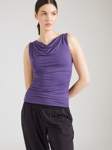CURARE Yogawear - Top deportivo en lila: frente