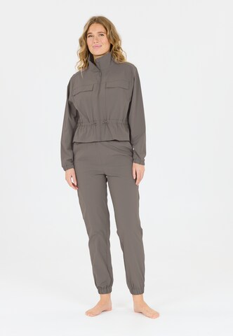 Athlecia Tapered Sporthose 'Hero' in Braun