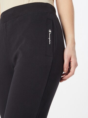 Champion Authentic Athletic Apparel Zwężany krój Spodnie w kolorze czarny