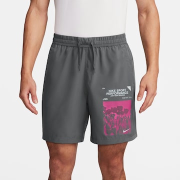 NIKE Regular Workout Pants in Grey: front