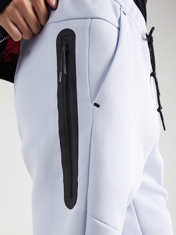 Nike Sportswear - Tapered Calças 'TCH FLC' em azul