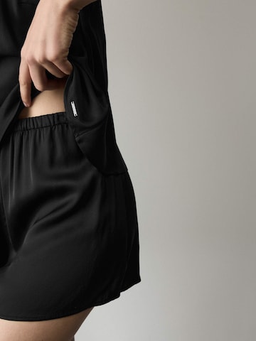 Pigiama di Marks & Spencer in nero