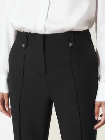Next - Bootcut Pantalón en negro