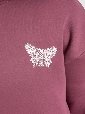 Veste de survêtement ' Nala ' Smilodox en rose