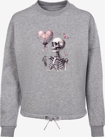 Sweat-shirt 'Skelett hält Herzballon' F4NT4STIC en gris : devant