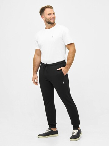 NIKIN Tapered Trousers 'Tree' in Black