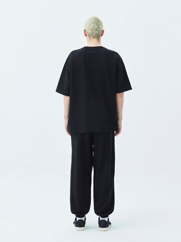 Maglietta di VAMOS CLO in nero
