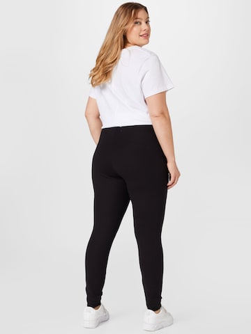 Skinny Leggings de la Tommy Jeans Curve pe negru