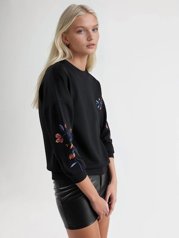 Sweat-shirt Hiccup en noir