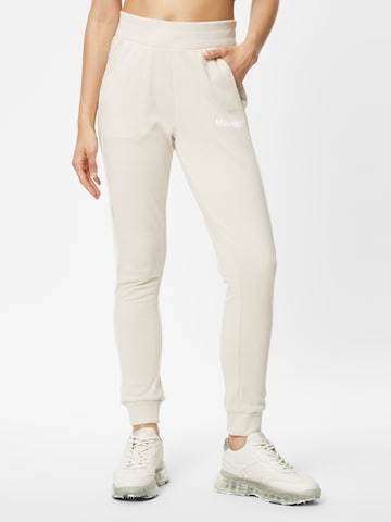 Effilé Pantalon de sport 'Legacy' Hummel en beige : devant